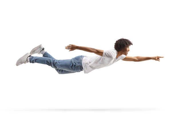 istock African american man flying and pointing 1476703122