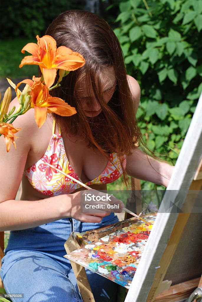 Young woman painting outdoors RELATED IMAGES: Candid stock illustration