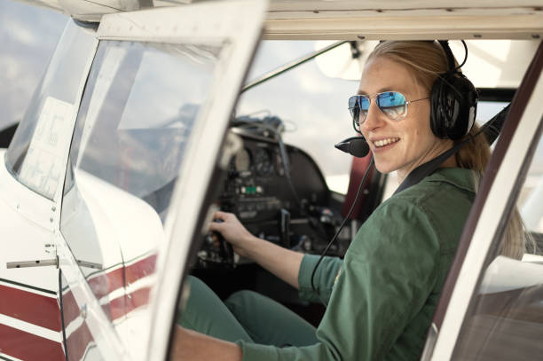 istock A female pilot with her sport plane 1476704362