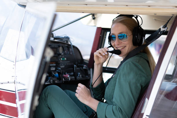 istock A female pilot with her sport plane 1476704370