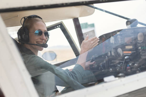 istock A female pilot with her sport plane 1476704372