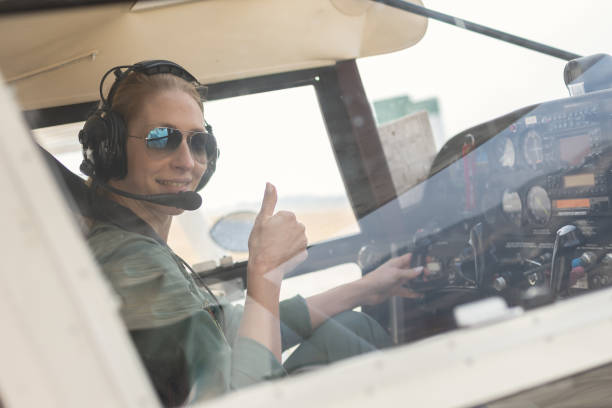 istock A female pilot with her sport plane 1476704375