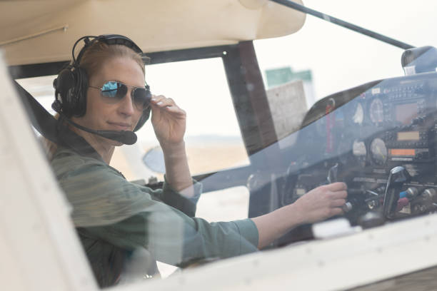 istock A female pilot with her sport plane 1476704382