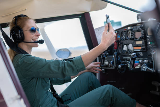 istock A female pilot with her sport plane 1476704385