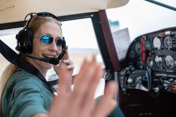istock A female pilot with her sport plane 1476704395
