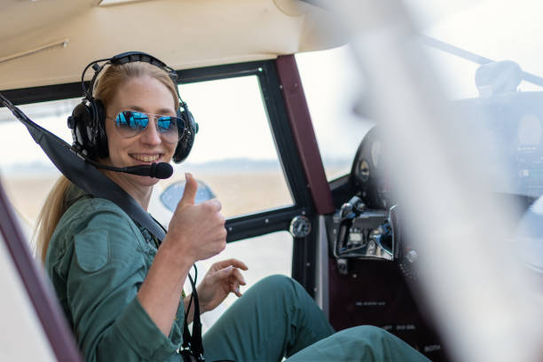 istock A female pilot with her sport plane 1476704406