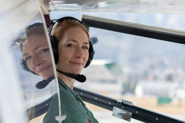 istock A female pilot with her sport plane 1476704467