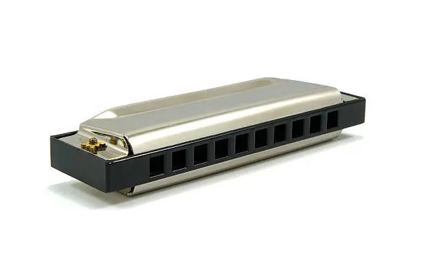 harmonica isolated on white with shadows