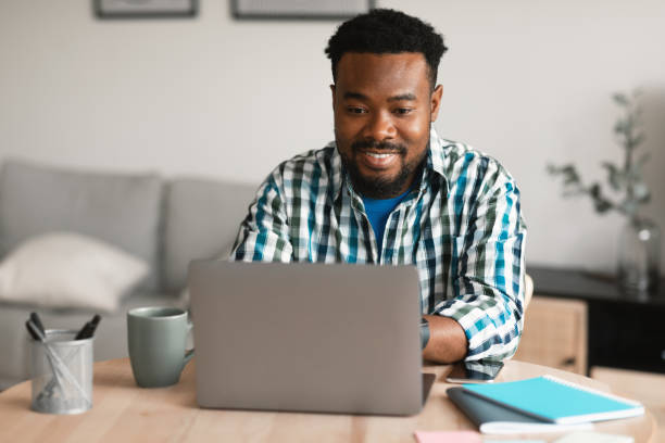 istock African American Entrepreneur Man Using Laptop Working Online At Home 1476710262