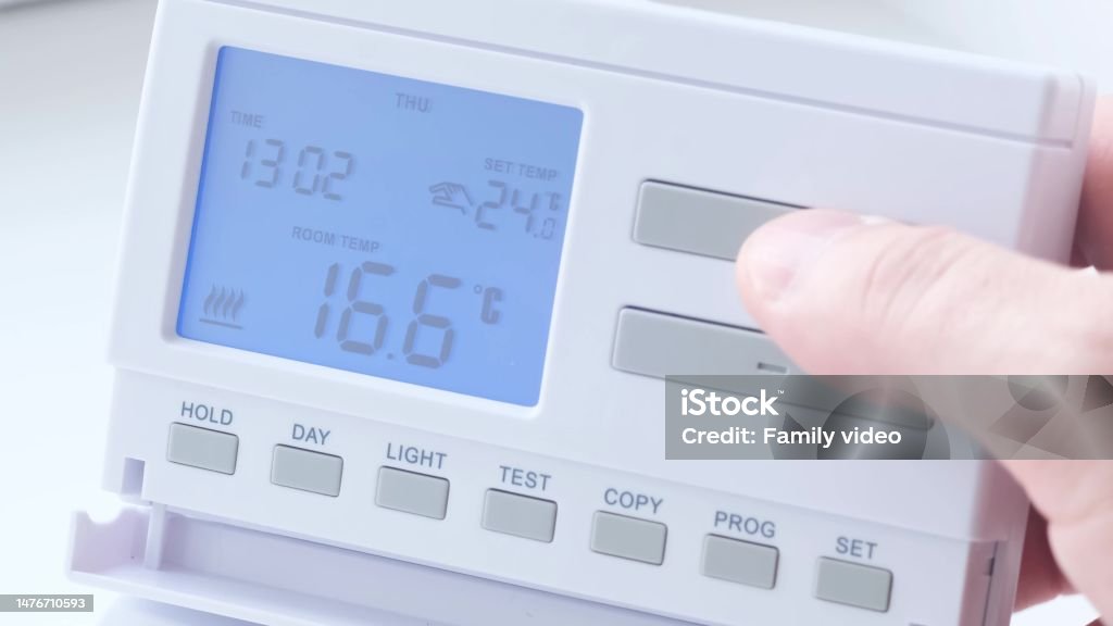 Temperature regulation in the house. Radiator control panels for room heating. Temperature regulation in the house. Radiator control panels for room heating. Heating the house in the cold season. Adjusting Stock Photo