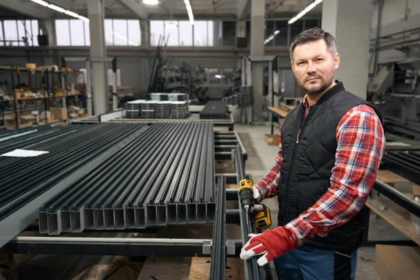 istock Adult man standing next to metal structure 1476714089
