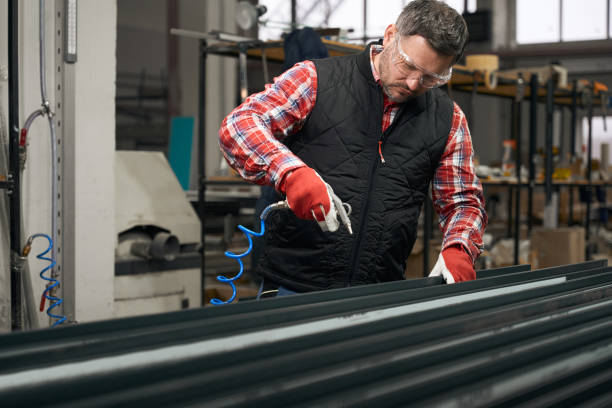 istock Adult man using compressed air to working 1476714174