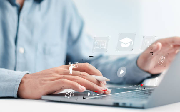 istock Person who attends online lessons on a digital screen. Education on internet, e-learning concept. Education internet Technology. 1476714657