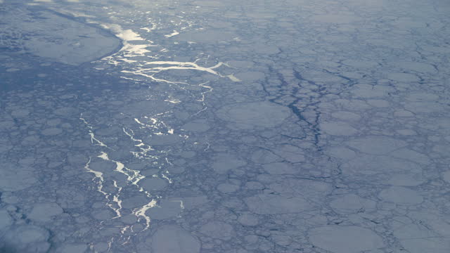 A view of frozen Greenland landscape from the air