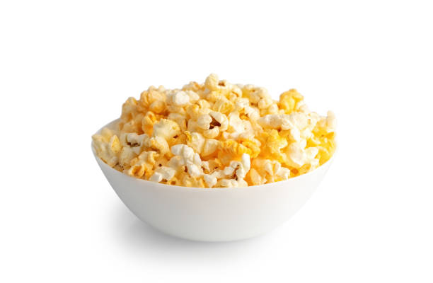 istock Tasty cheese popcorn in bowl isolated on white background close up 1476717676