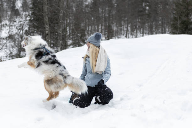 istock Friends on a hike through a snowy valley. 1476722964