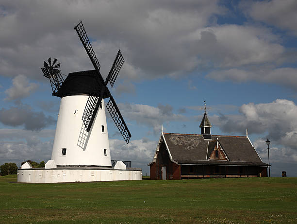 Windmill on Lytham St Annes promenade Windmill and lifeboat house on Lytham St Annes promenade in Lancashire, England. See similar images in my portfolio lytham st. annes stock pictures, royalty-free photos & images
