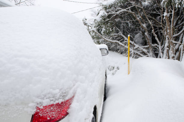 istock Car under lot of snow 1476723717