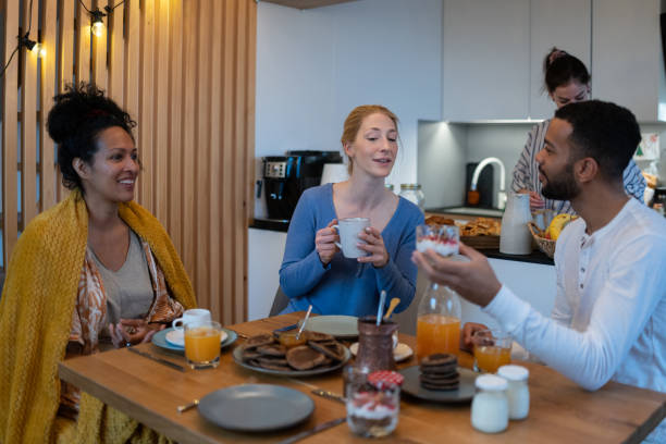 istock Breakfast in pajamas with visiting friends 1476724341