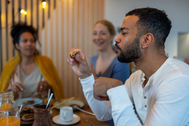 istock Breakfast in pajamas with visiting friends 1476724365