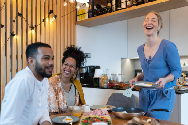 istock Breakfast in pajamas with visiting friends 1476724429