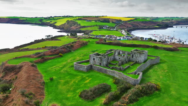 Aerial view of old ruin structure, Kinsale, Ruins of James Fort Ireland, Historical monastery, James Fort, Co. Cork, Ireland, View of green hill,Aerial view of James fort Kinsale Ireland, Charles Fort Kinsale, Stone building left in Ruin