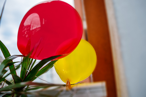 Red and yellow balloon on the terrace