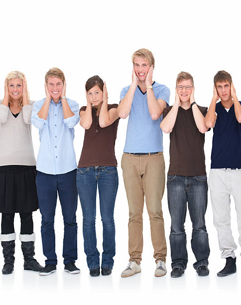 istock Group of young men and women with hands on ears 147672921