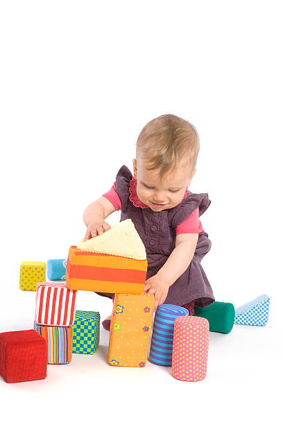 istock Baby palying with toy blocks 147673112