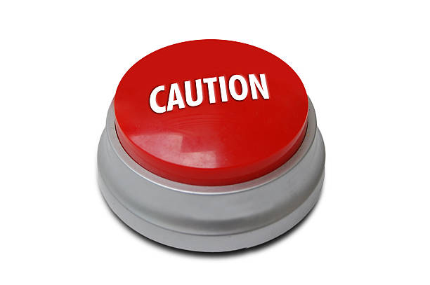 Red Caution Button stock photo
