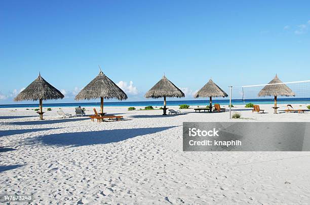 Resort Beach Stock Photo - Download Image Now - Beach, Bench, Blue