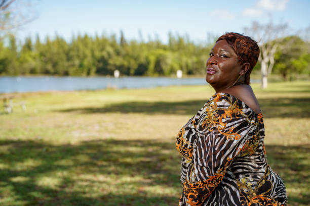 istock Image of a plus size model bbw posing outdoors in the park 1476733660