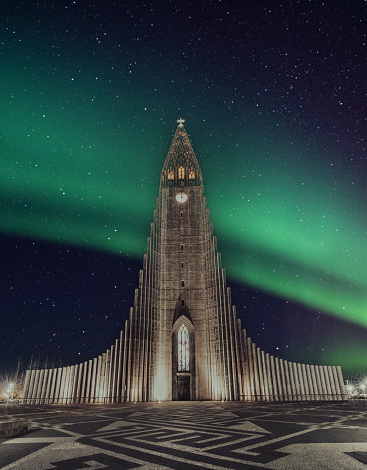 Hallgrims Church Hallgrimskirkja in Reykjavík Iceland with northern lights