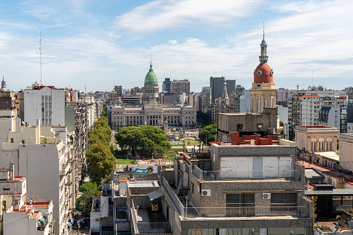 Stunning panoramic view of Buenos Aires' iconic skyline, featuring a mix of modern and historic architecture set against the backdrop of the South American city. This photo captures the energetic and cosmopolitan vibe of Buenos Aires, making it an ideal addition to any travel or tourism campaign.