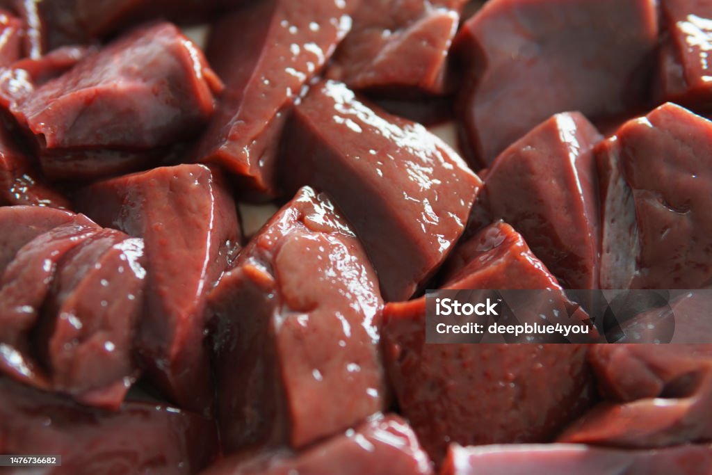 Sliced Sliced raw liver Sliced raw liver. Liver is incredibly rich in nutrients and vitamins Liver - Offal Stock Photo