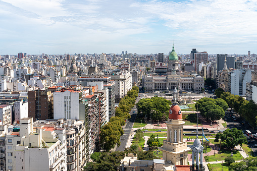 The iconic neoclassical structure, known as the Legislative Palace, is the centerpiece of the city's political power and a symbol of democracy in Argentina. Its majestic columns and intricate details stand out against the modern skyline, showcasing the unique blend of old and new that defines the vibrant city. This image is a must-have for anyone interested in architecture, history, or politics, and is perfect for travel or educational materials.