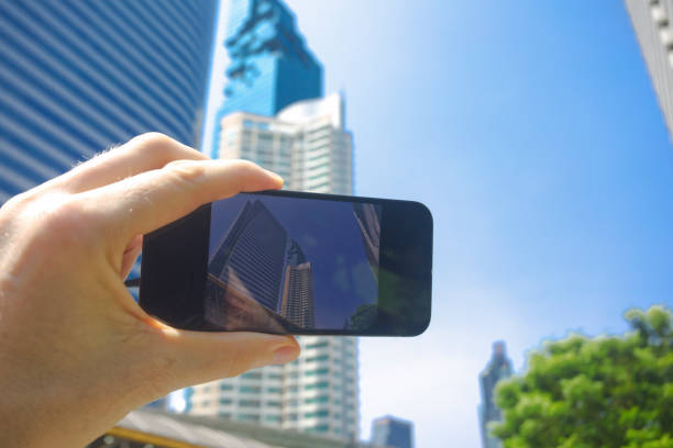 istock Skyscraper skyline at Bangkok Sathorn on mobile phone 1476738176