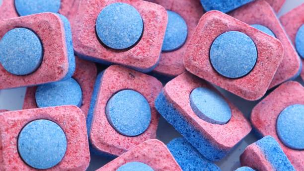 Many dishwasher detergent tablets close-up. 4k video stock photo