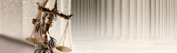 Lady Justice And Columns Of  A Courthouse Facade stock photo