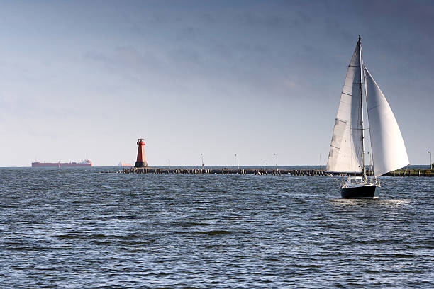istock Boat entering to harbor. 147674419