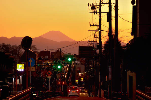 Evening view with Mt. Fuji seen from Setagaya-Daita Station, Tokyo Evening view with Mt. Fuji seen from Setagaya-Daita Station, Tokyo setagaya ward stock pictures, royalty-free photos & images