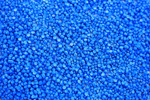 istock Close-up of light blue plastic polymer granules. polymer plastic. compound polymer. PVC resin compounds. Tinted plastic granulate for injection moulding process. 1476751931