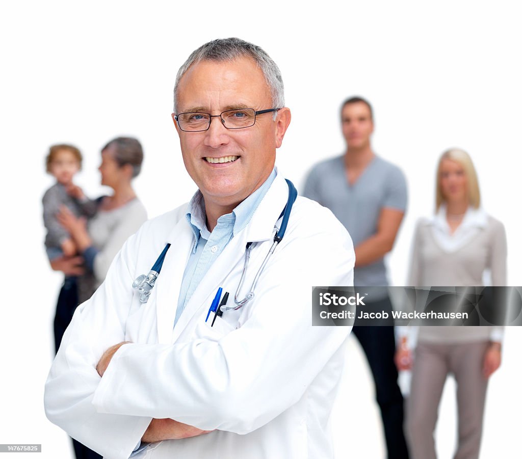 Sénior feliz médico com a família em pé fundo - Royalty-free 60-64 anos Foto de stock