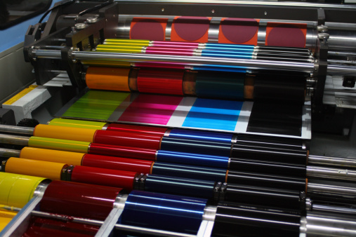 CMYK Ink rollers on an offset printing press