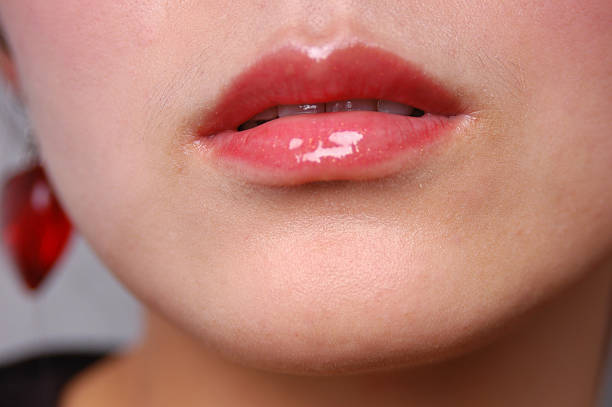 istock close up of female lips 147676372