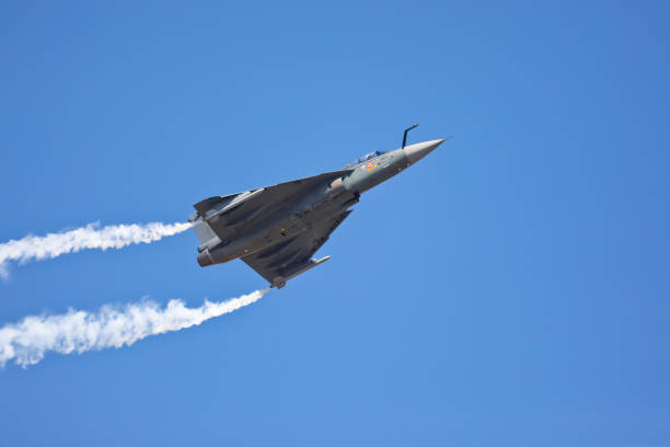 Bangalore KA India - February 16, 2023 - Taken this picture at Aero India in Bangalore India of LCA Tejas on flying display in front of general public. This is open to public and public has full access for photography, videography and even taking joy ride.