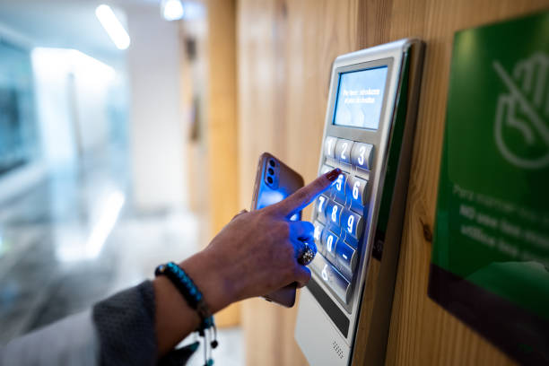 Close-up of a human hand pressing button elevator