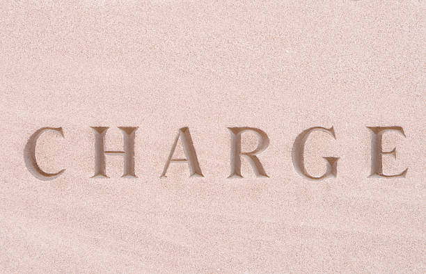 istock Word "Charge" Carved in Sandstone 147678176
