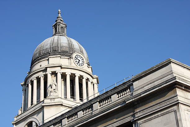 The imposing entrance to the National Gallery overlooking Trafalgar Square at sunrise in the heart of London, UK.