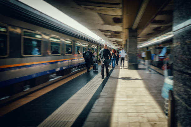 istock Central railway station with people. 1476783819
